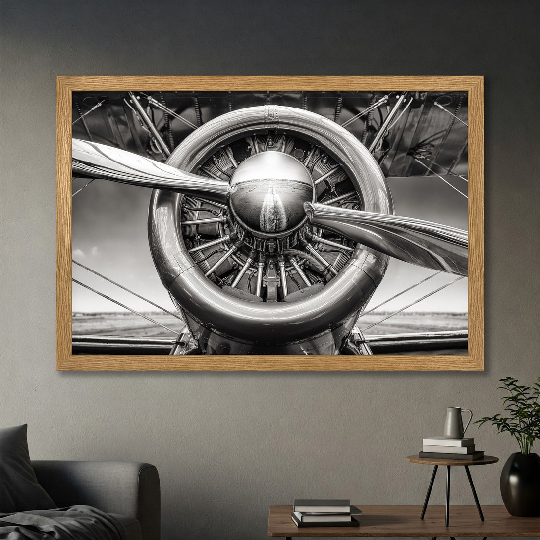 Framed Poster of vintage airplane propeller in monochrome, perfect for aviation enthusiasts. Adds a touch of classic style.