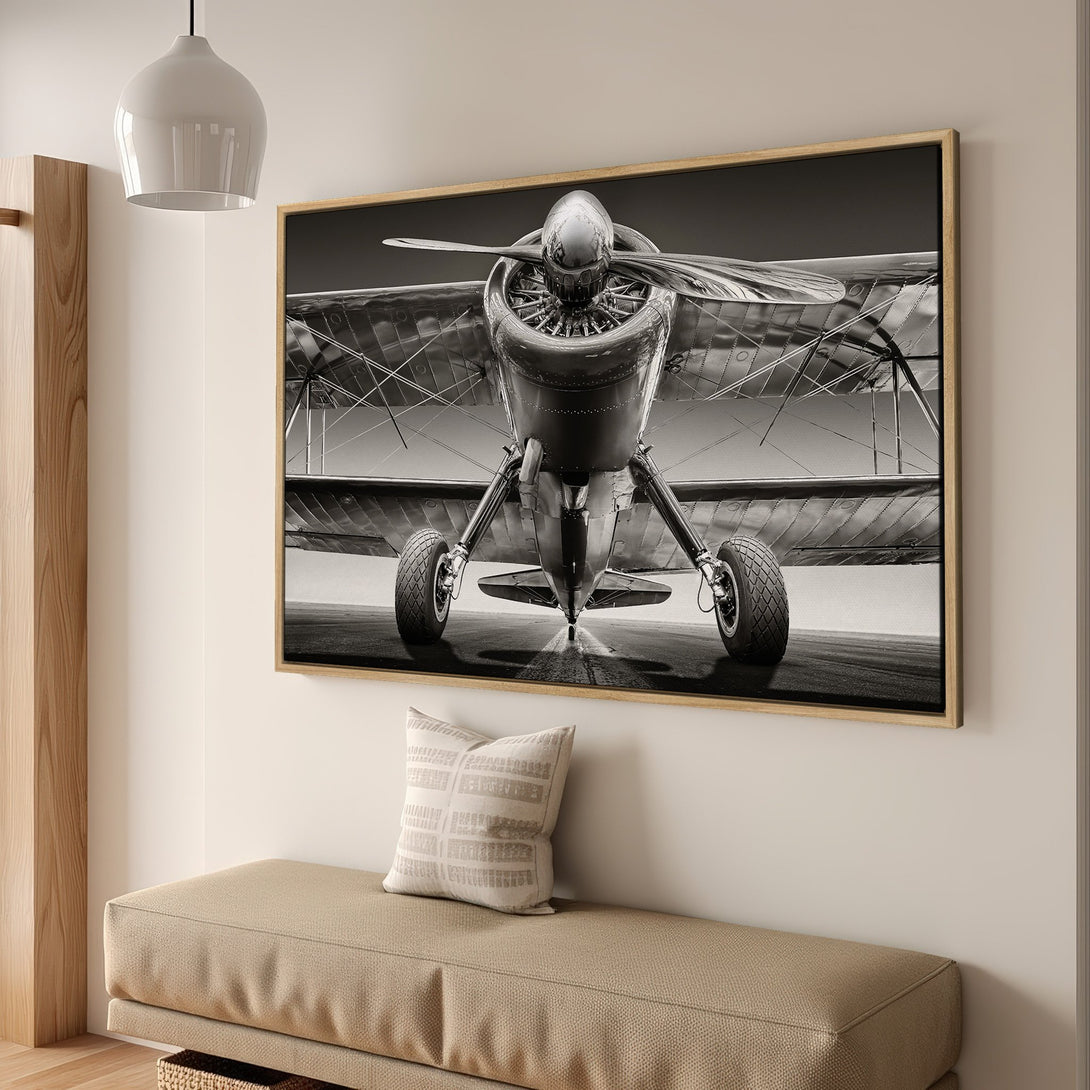Framed Wall Art: Vintage airplane canvas print in a black and white color palette. Perfect aviation decor for your home or office.