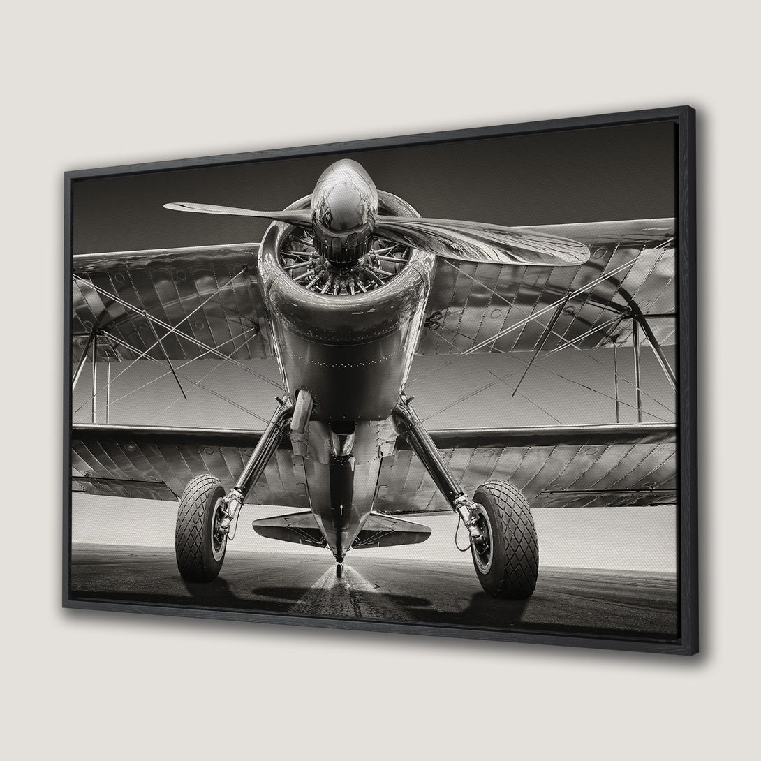 Framed Wall Art: Vintage airplane canvas print in monochrome tones. Perfect aviation decor for your home or office. Add a touch of history to any space!