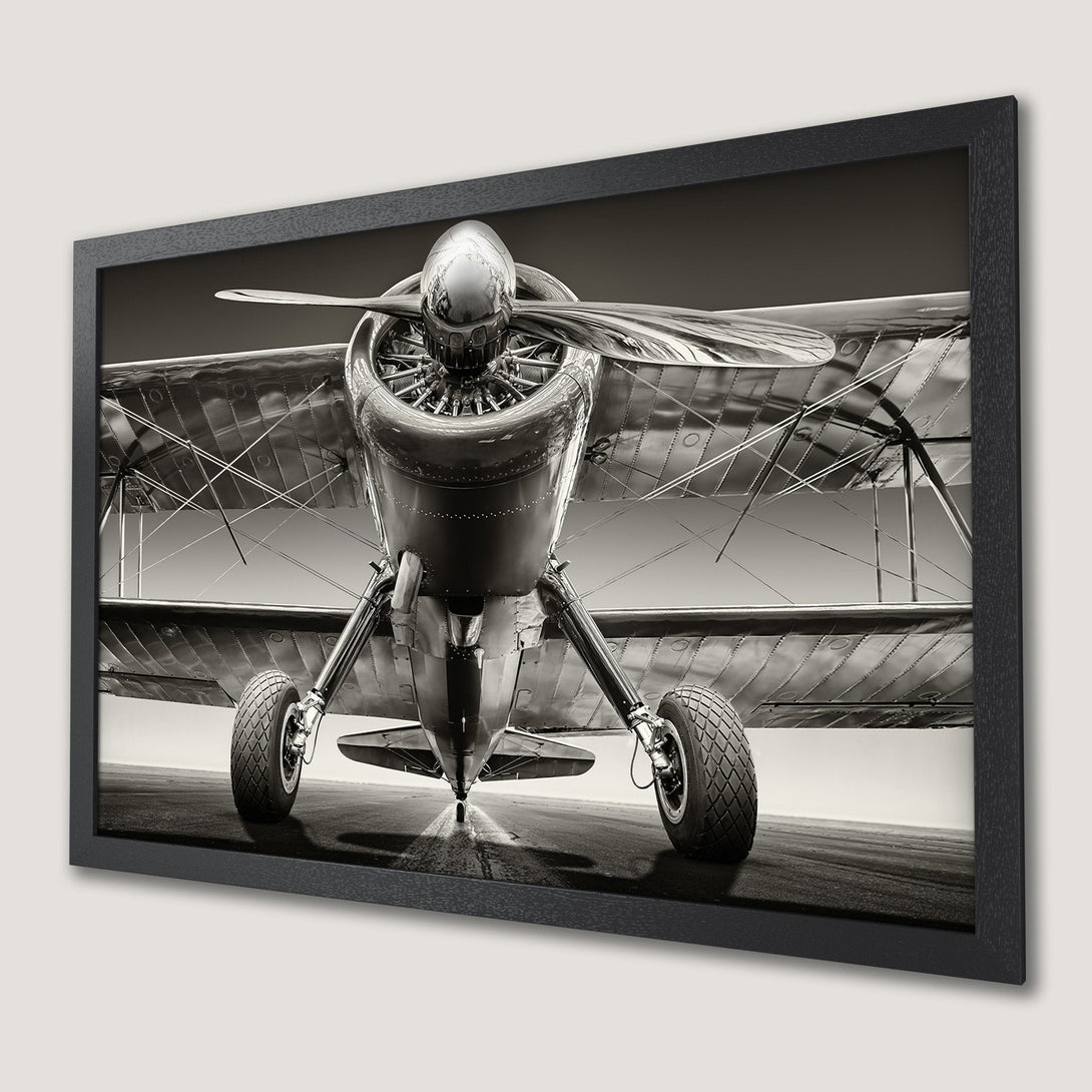 Framed Poster of a vintage biplane in sepia tones. Classic aviation art for your home.