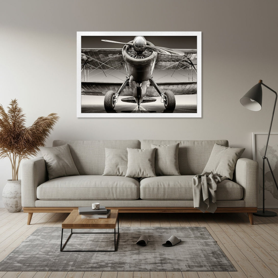 Framed Poster of vintage airplane in monochrome, perfect for aviation enthusiasts. Neutral color palette complements any decor.