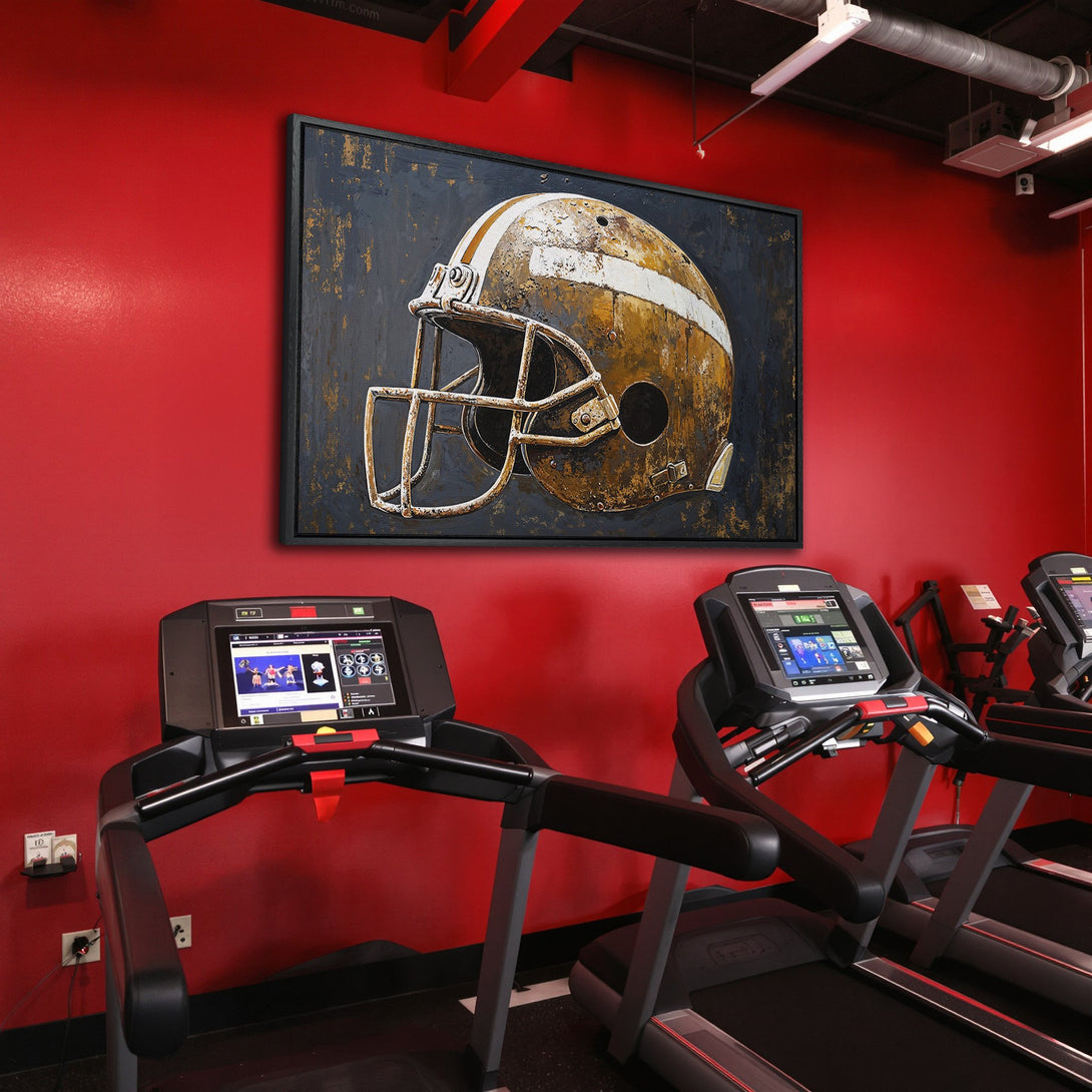 Framed Wall Art featuring a vintage football helmet in a gym, with a distressed style and a warm, earthy color palette. Elevate your space!