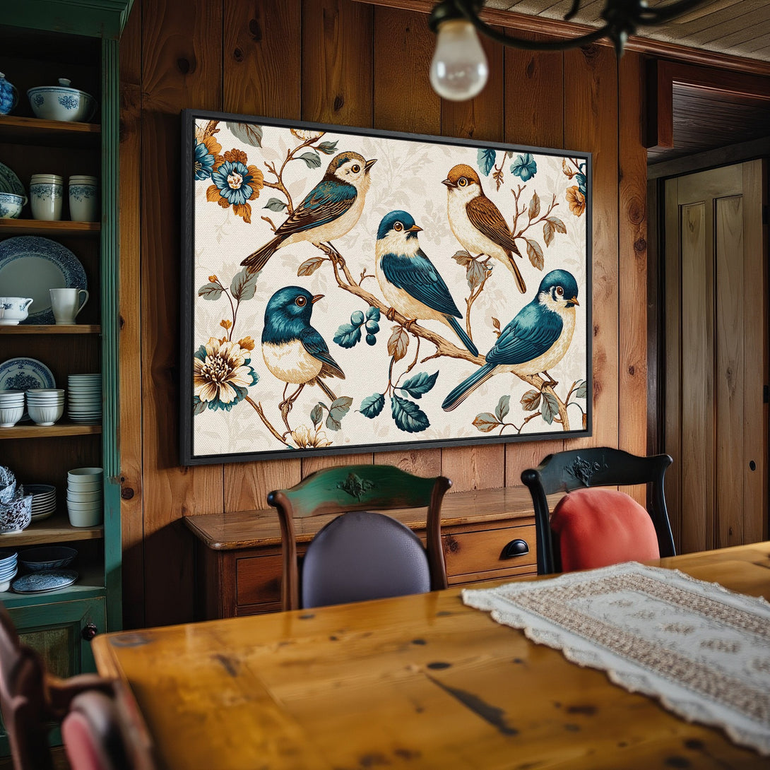 Framed Wall Art featuring vintage-style birds on a branch. Earthy tones with teal and gold accents. Perfect for adding a touch of nature to your space.