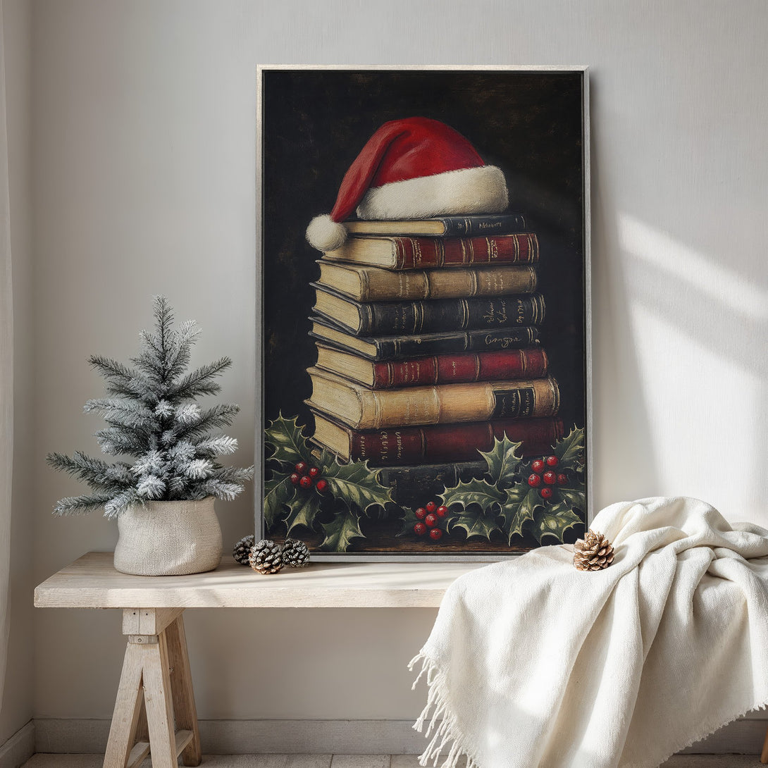 Framed Wall Art: Festive Christmas still life featuring a stack of books, Santa hat, and holly. Warm, vintage style with red, green, and neutral tones. Perfect holiday decor!