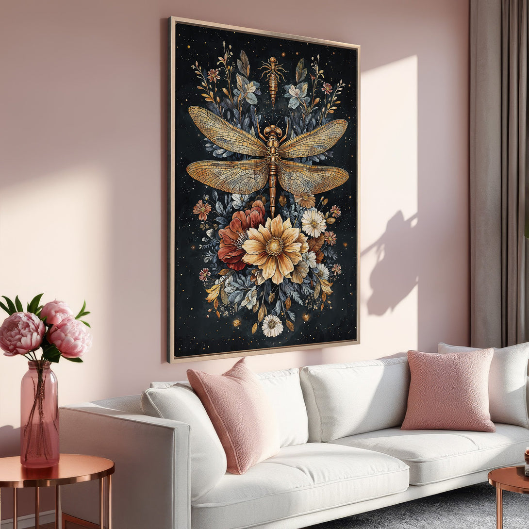 Framed Wall Art: Elegant dragonfly floral print in warm gold and orange tones, displayed in a modern interior with a pink color palette.
