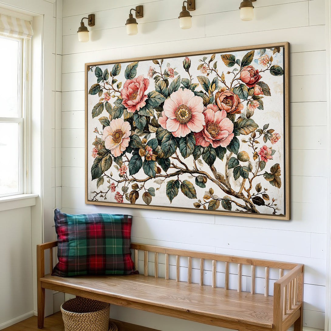 Framed Wall Art: Watercolor floral print in pink, green, and cream tones. Elegant botanical art for home decor, displayed in a cozy interior setting.