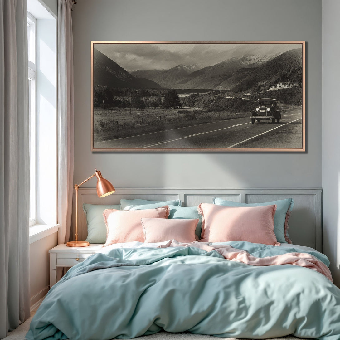 Framed Wall Art: Vintage black and white landscape print in a bedroom. Adds a touch of nostalgia with neutral tones and a pop of color.
