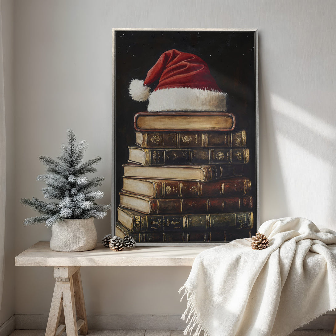 Framed Wall Art: Festive Christmas scene with Santa hat on books. Warm, rich color palette. Perfect holiday decor for your home!