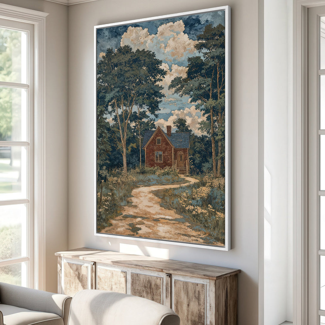 Framed Wall Art featuring a scenic landscape with a cottage. Earthy tones with blue sky and green trees. Perfect for adding a touch of nature to your home.