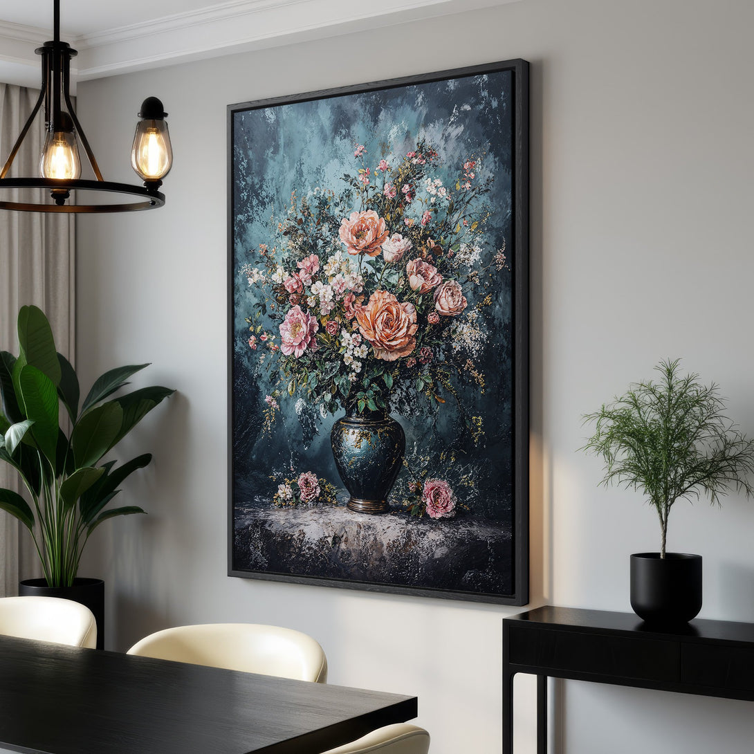 Framed Wall Art featuring a floral still life in a moody, painterly style. Soft pink and peach roses pop against a teal and dark blue backdrop. Elevate your space!