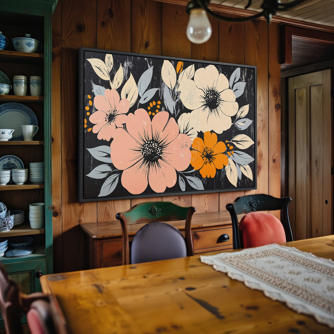Framed Wall Art featuring floral design in peach, orange, and cream on a black background. Perfect for adding a touch of modern art to your home.