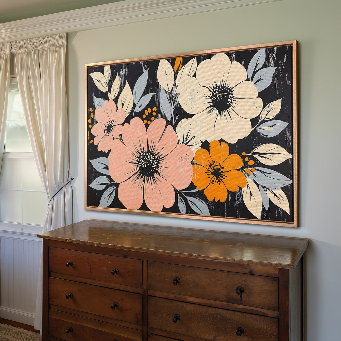Framed Wall Art featuring floral design in a modern style with a black, peach, and orange color palette. Perfect for adding a pop of color!