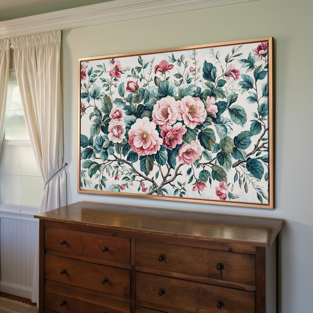 Framed Wall Art featuring a floral watercolor design in pink, teal, and green. Adds a touch of elegance to any interior.