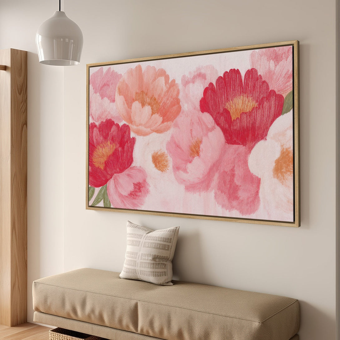 Framed Wall Art featuring vibrant floral peonies in pink and red hues. Modern, artistic canvas print perfect for adding a pop of color to your home decor.
