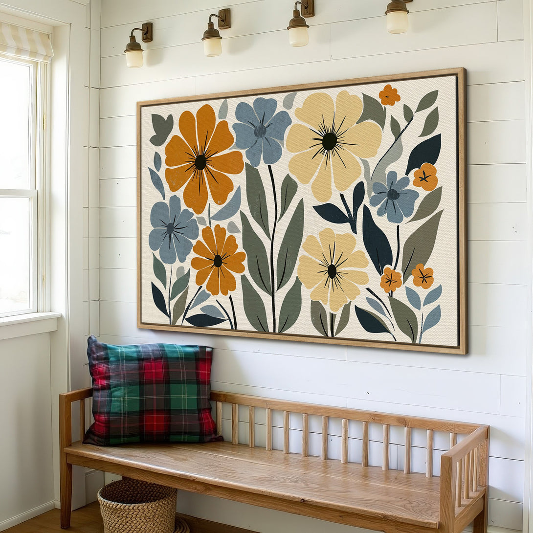 Framed Wall Art featuring floral design in warm yellow, orange, and blue tones. Modern art canvas print adds a pop of color to any space.