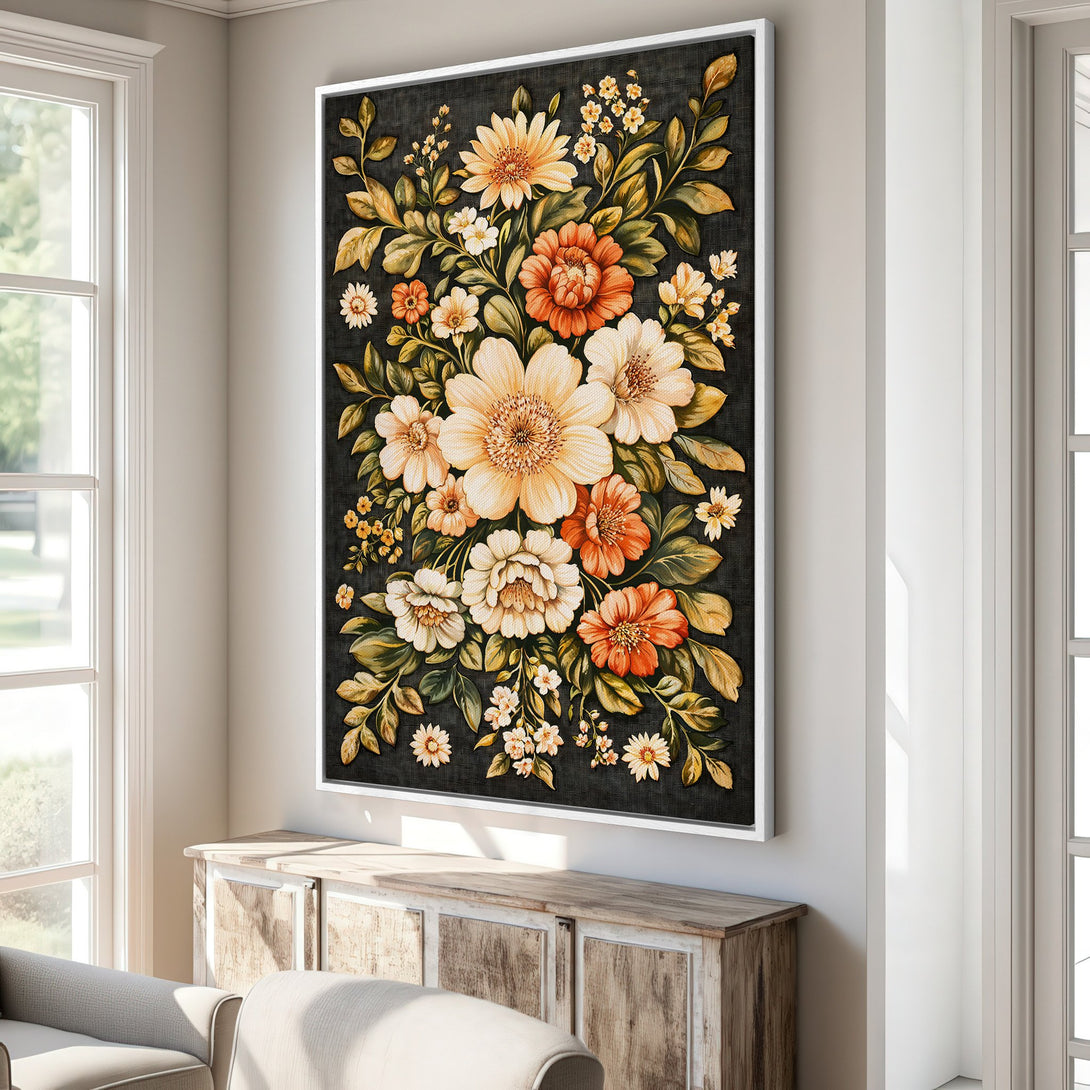 Framed Wall Art: Floral Canvas Print with warm orange, yellow, and green blooms on a dark backdrop. Adds a touch of elegance to any interior space.
