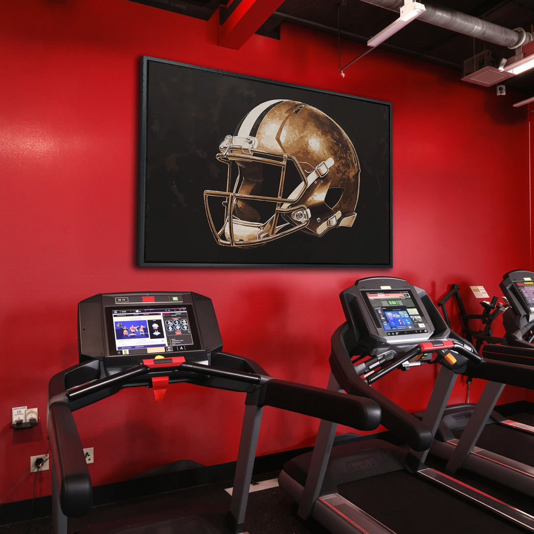 Framed Wall Art of a football helmet in a gym setting. Bronze and black color palette. Modern, sporty decor. Add style to your space!