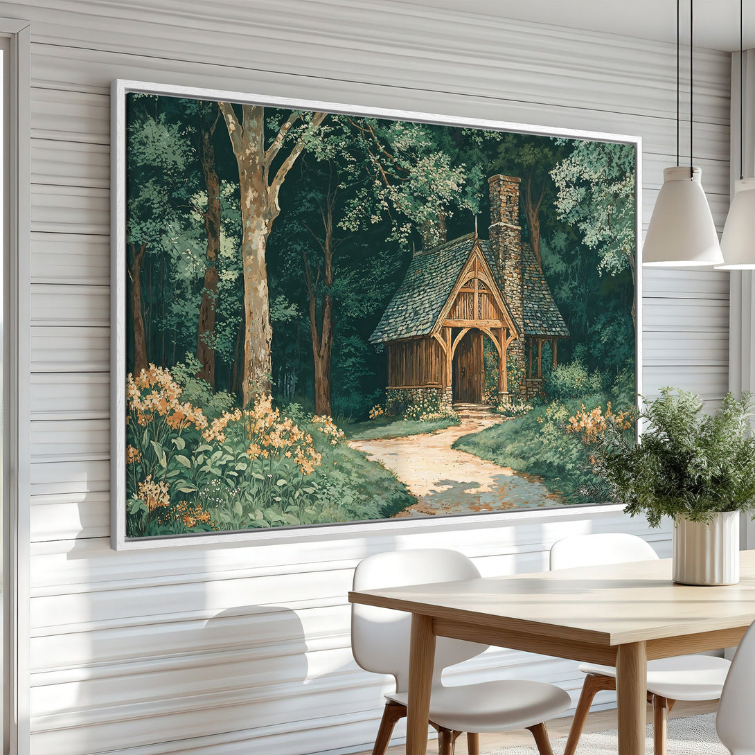 Framed Wall Art of a cabin in the woods. Rustic style with a green and beige color palette. Perfect for adding a touch of nature to your home.