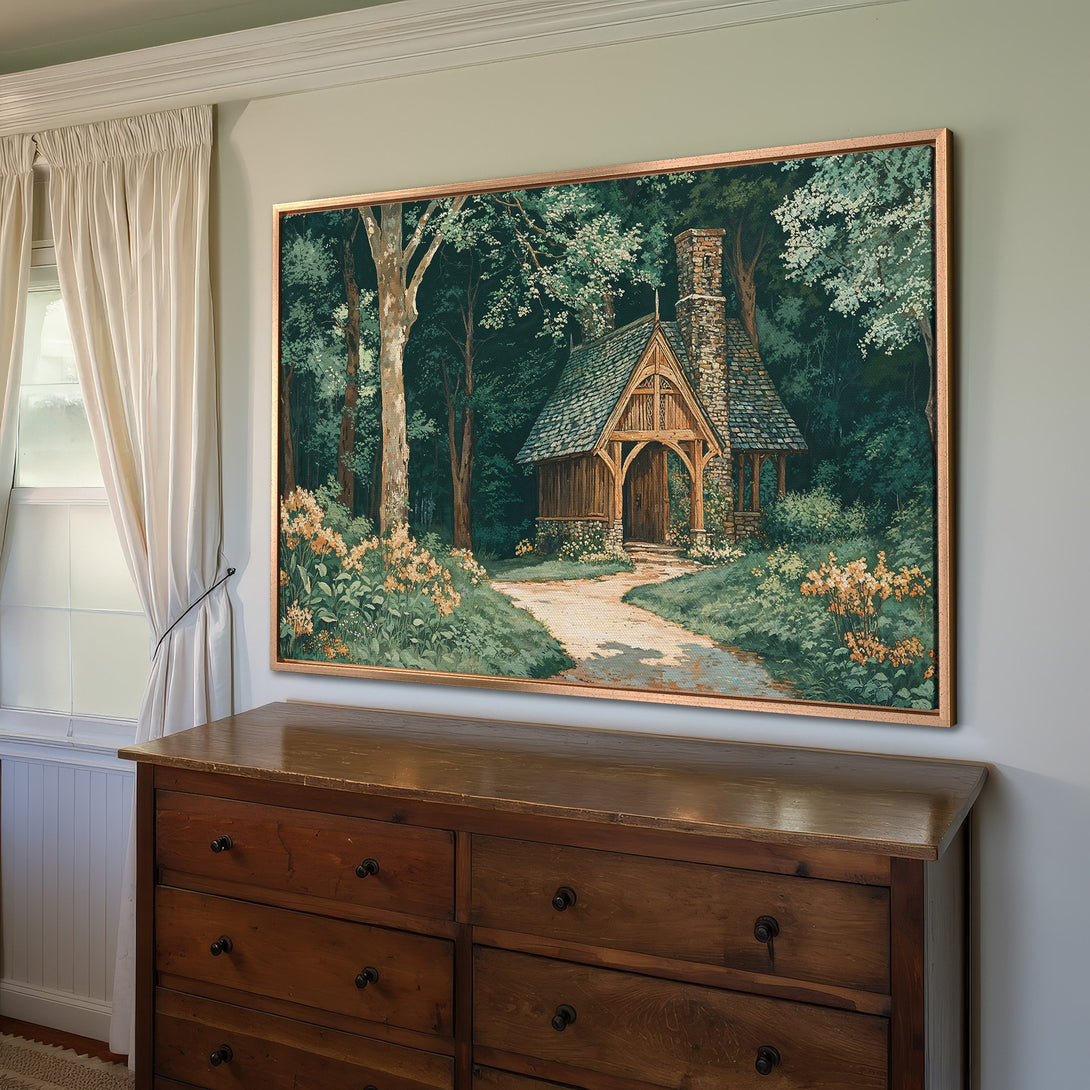 Framed Wall Art: Serene forest cottage scene in green and gold tones. Rustic art print adds a touch of nature to your home decor.