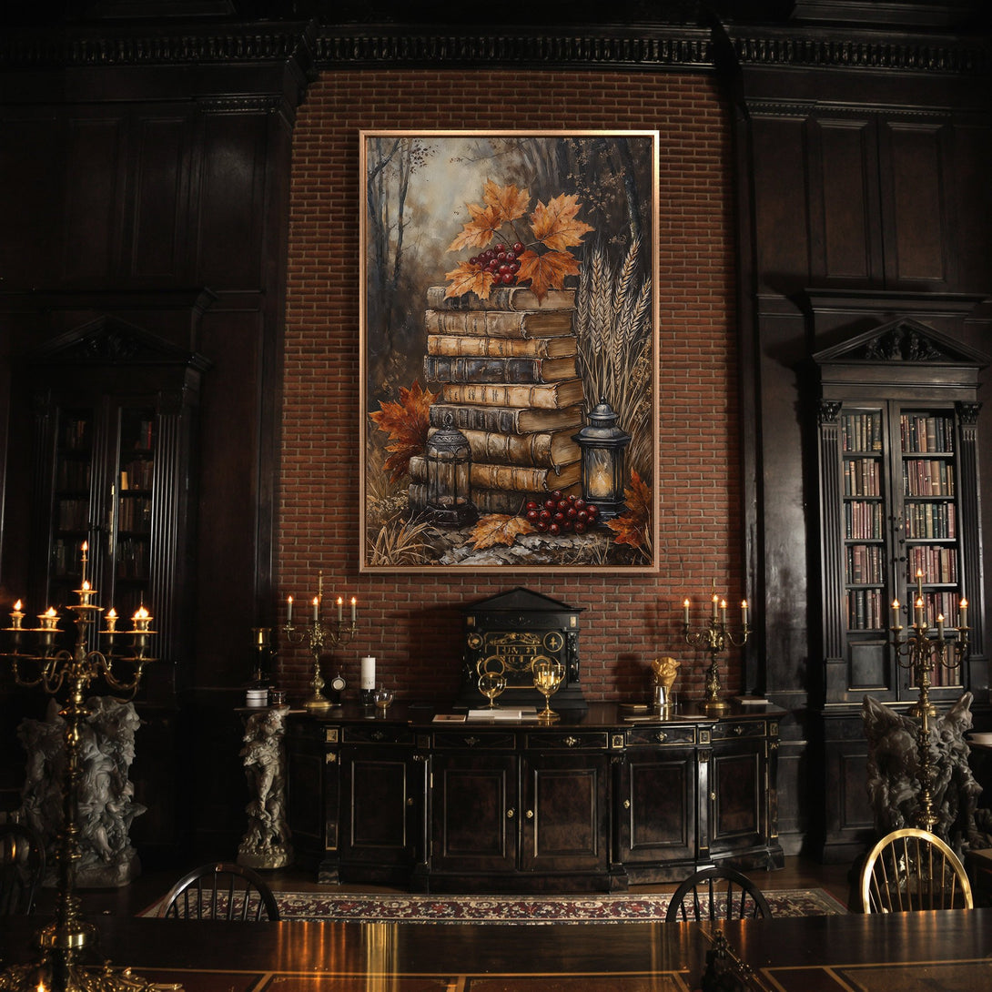 Framed Wall Art of books, leaves, and berries in a dark, moody interior. Warm, earthy tones with a vintage, classical style. Perfect for a library or study.