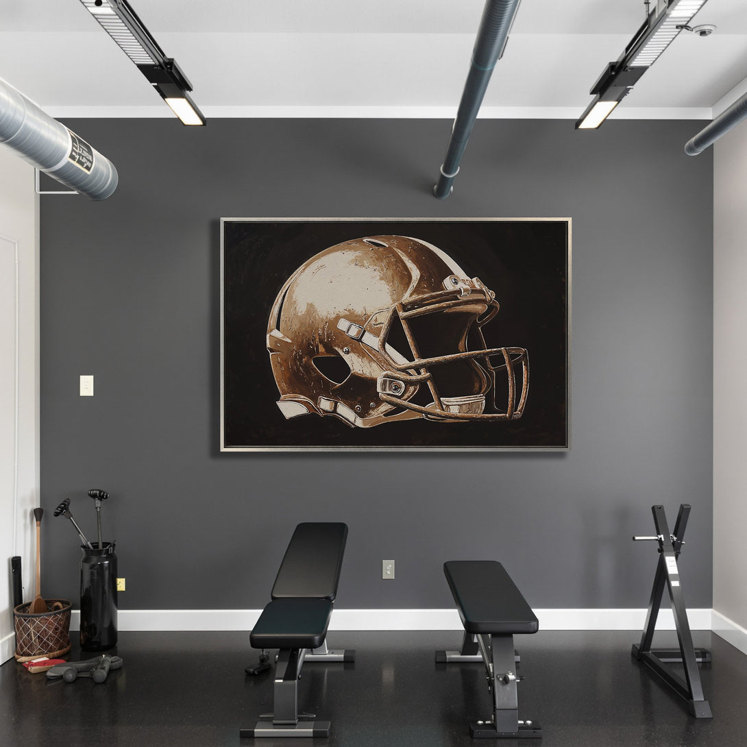 Framed Wall Art: Football helmet art in a modern gym. Neutral color palette with black, gray, and bronze tones. Elevate your space with this stylish canvas print.