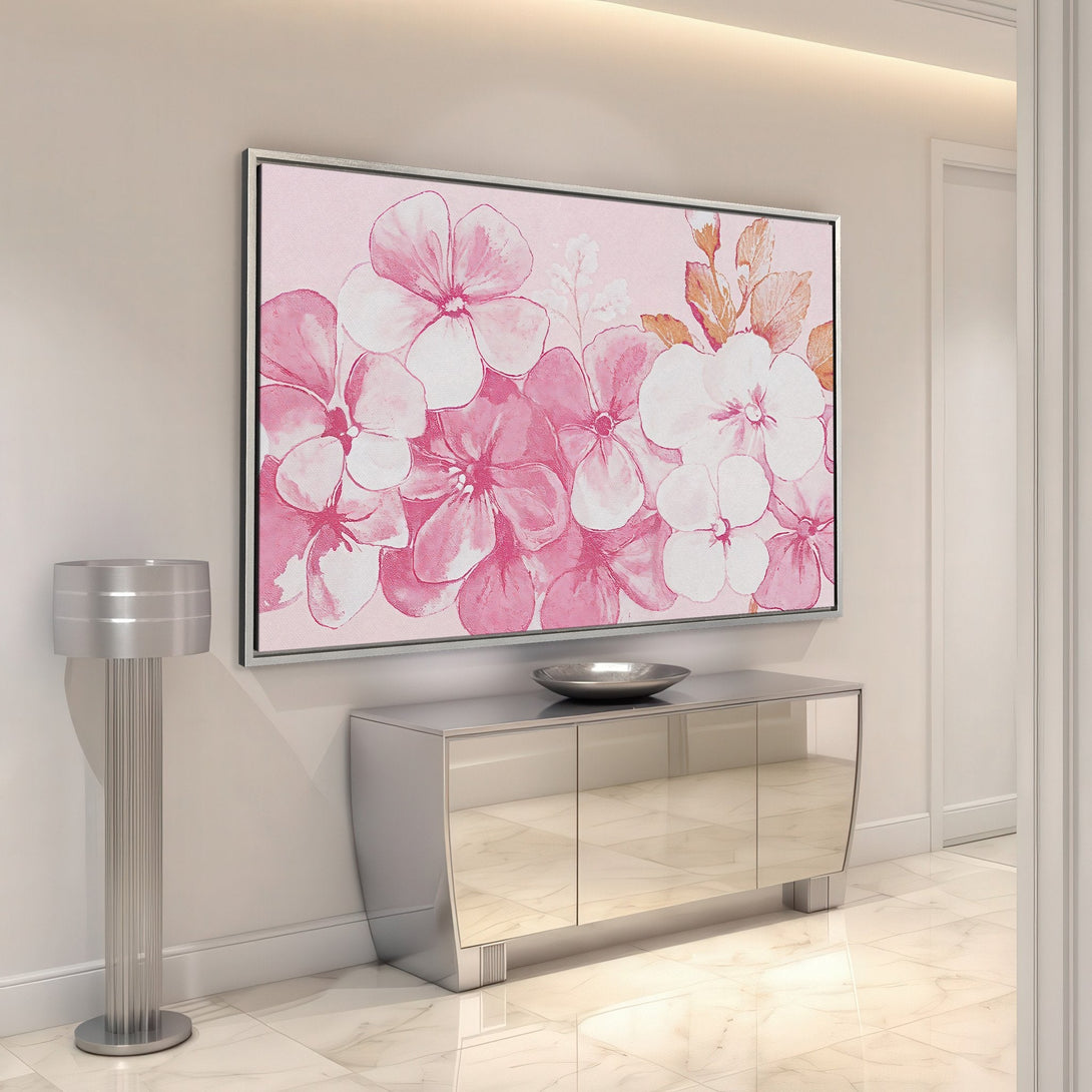 Framed Wall Art featuring watercolor floral design in pink and white hues. Perfect for adding a touch of elegance to your home decor.