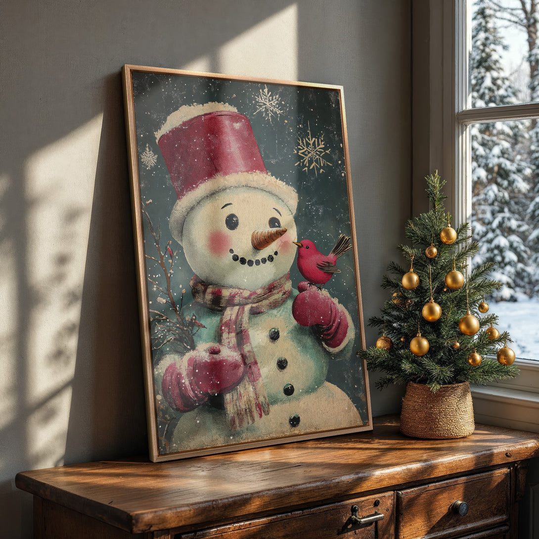 Framed Wall Art: Vintage snowman print in a cozy interior. Features a charming snowman with a red bird, in a muted color palette, perfect for holiday decor.