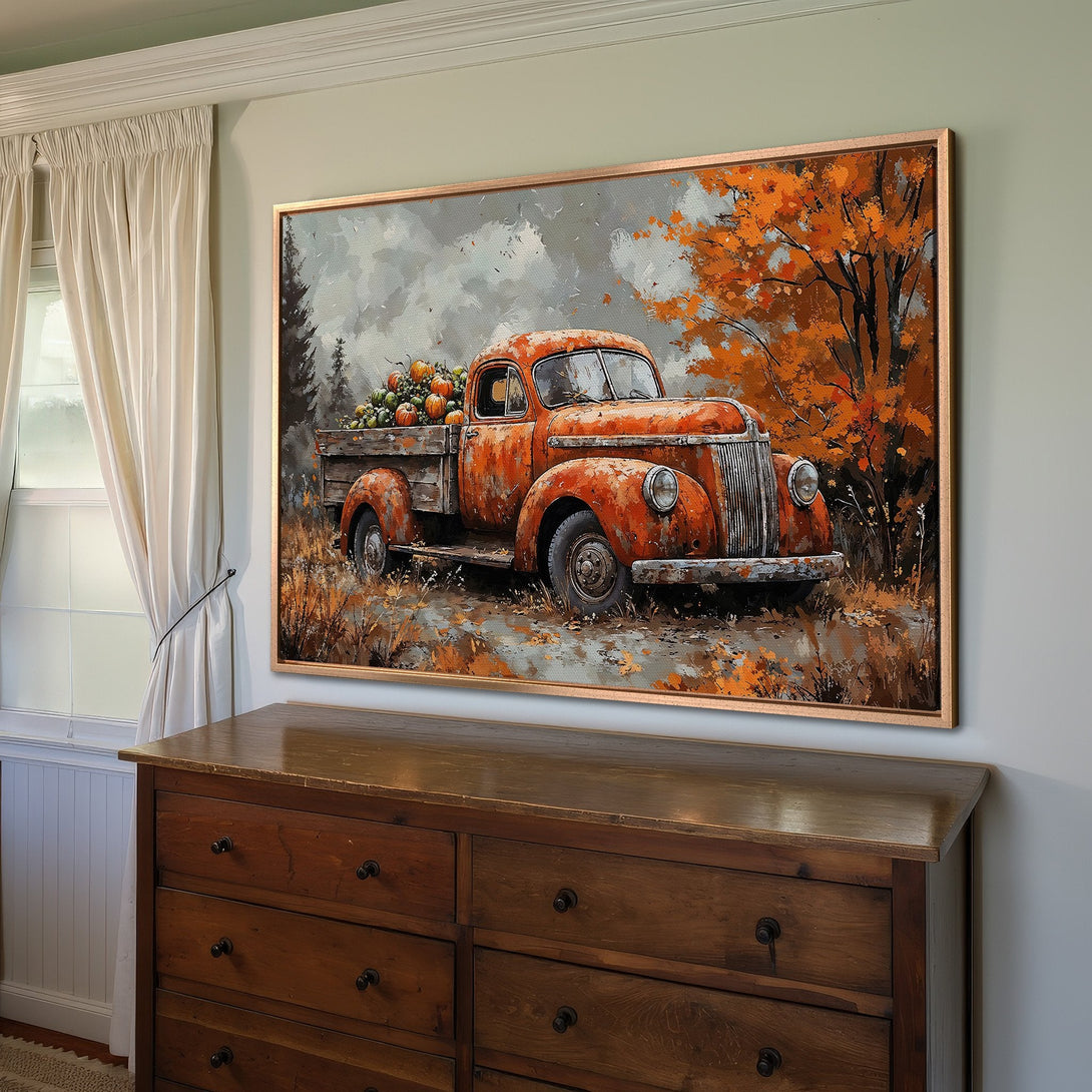 Framed Wall Art: Rustic autumn scene with vintage truck, pumpkins, and fall foliage in warm orange and brown tones. Perfect for cozy decor!