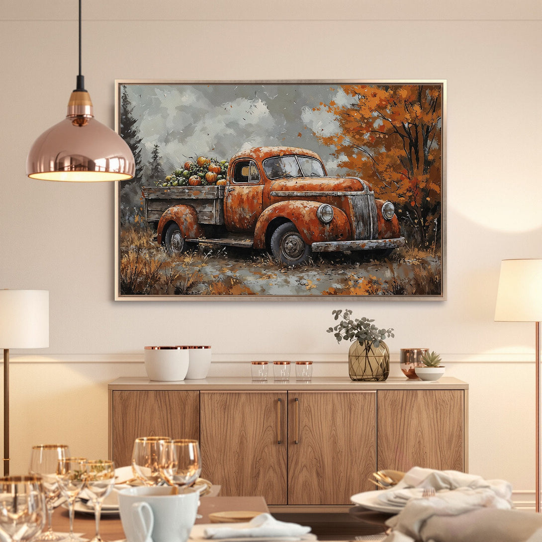 Framed Wall Art: Rustic orange truck with pumpkins in a fall landscape. Perfect autumn decor with warm, inviting colors.