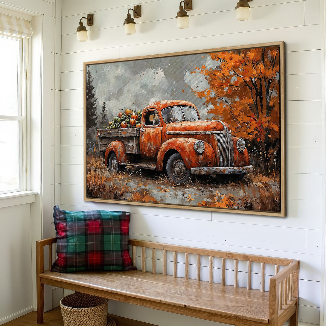Framed Wall Art featuring a vintage truck in a fall landscape. Warm orange and brown color palette, perfect for autumn decor.