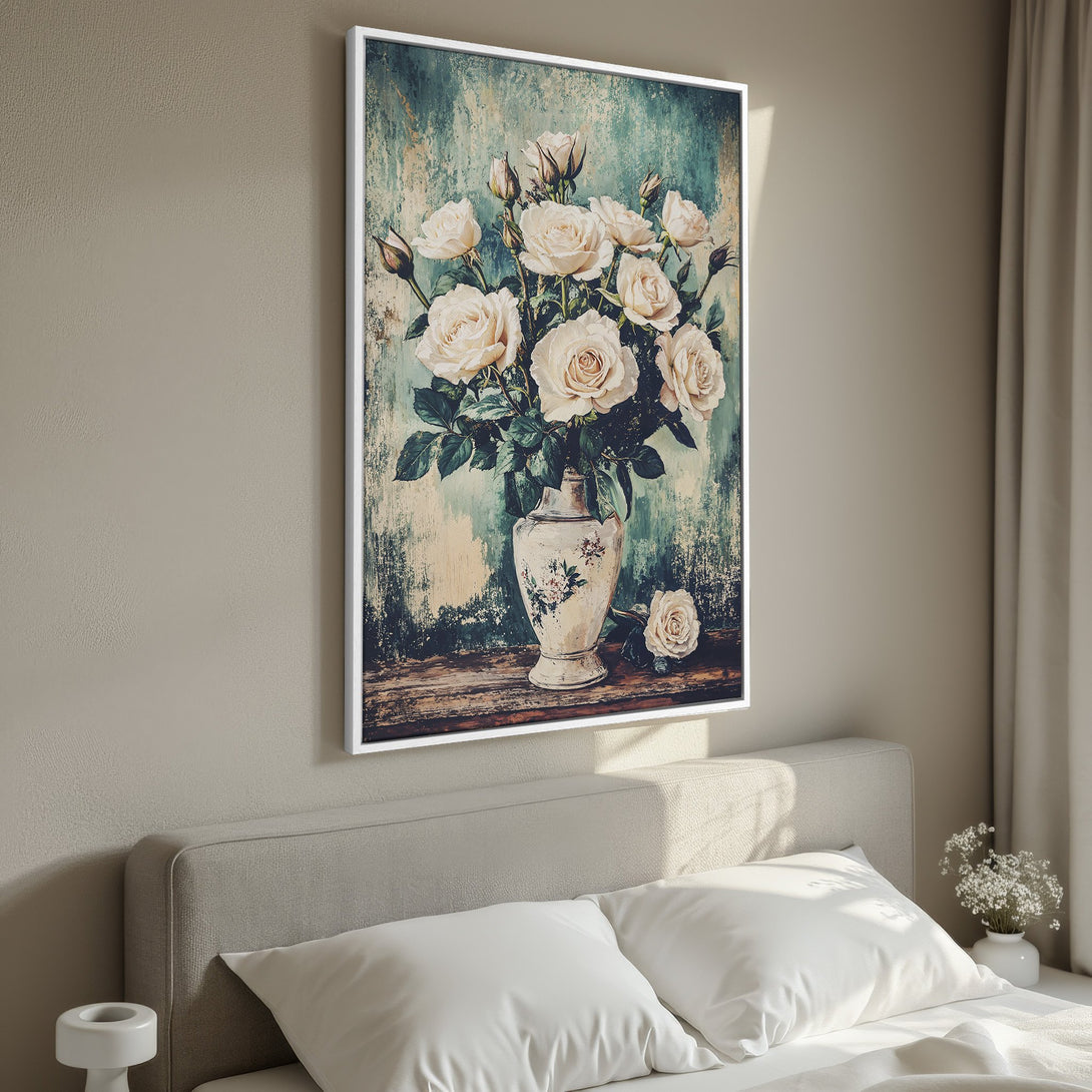 Framed Wall Art featuring a vintage floral still life of white roses. Soft, muted color palette adds a touch of elegance to any bedroom.