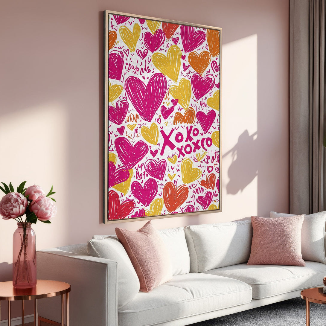 Framed Wall Art featuring a vibrant heart design in pink, yellow, and orange. Modern, romantic art for your home. Perfect for Valentine's Day!