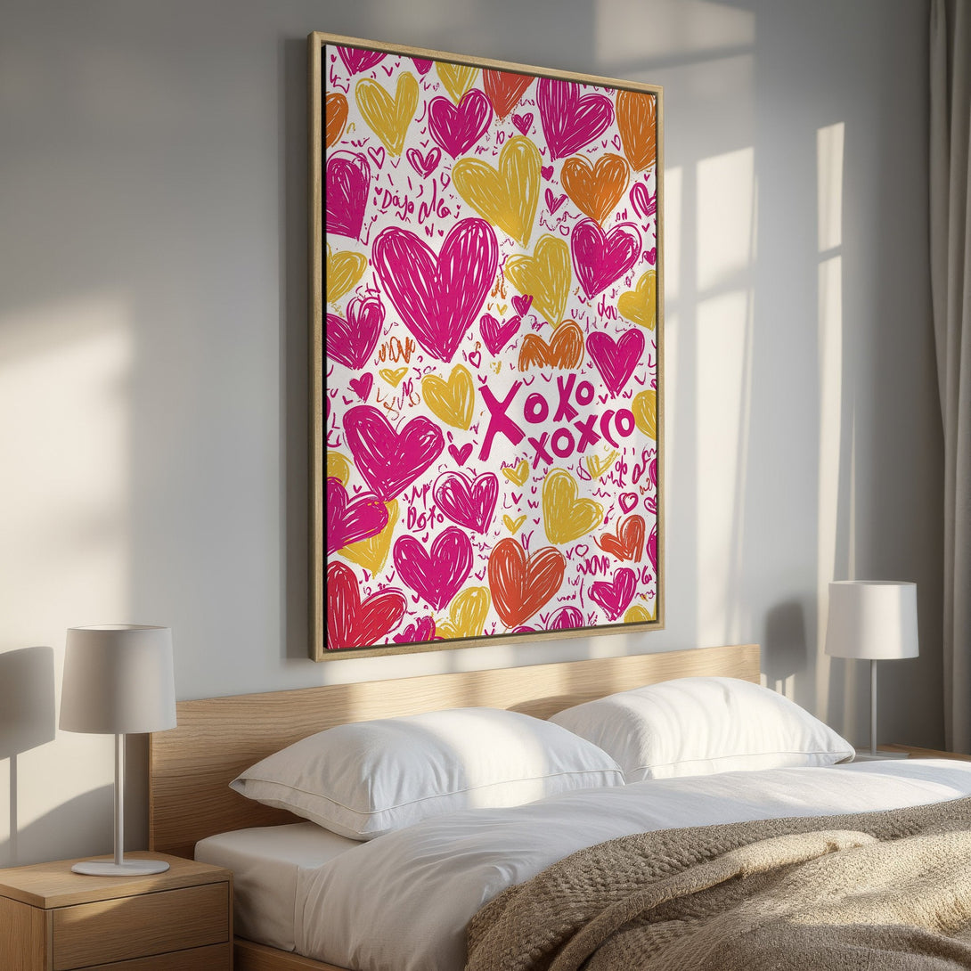 Framed Wall Art featuring a vibrant heart design in pink, orange, and yellow. Perfect for adding a pop of color and love to any bedroom!