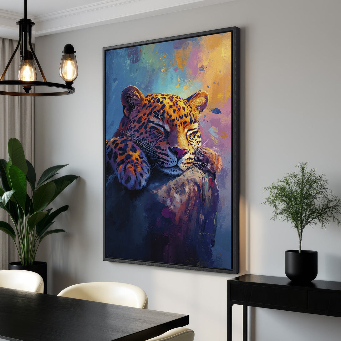 Framed Wall Art featuring a sleeping leopard in a vibrant, painterly style with a warm, colorful palette. Perfect for adding a touch of wildlife art to your home.