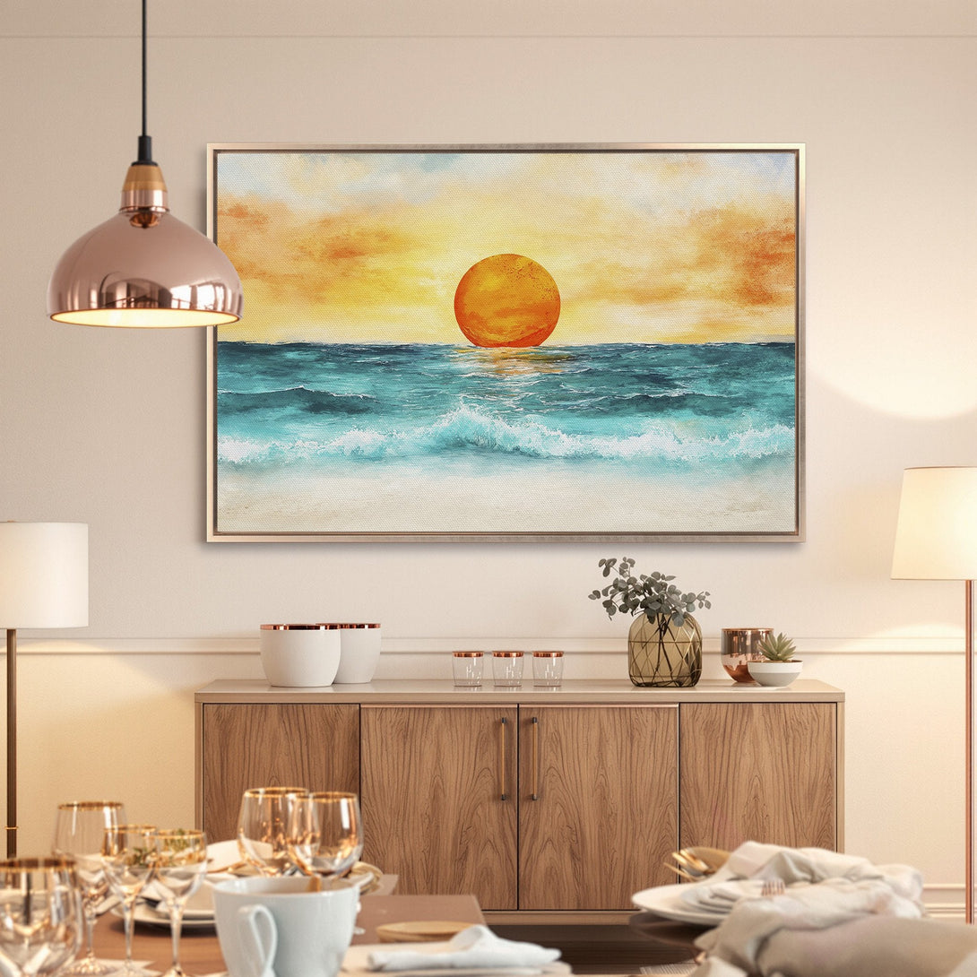 Framed Wall Art: Sunset over ocean in vibrant orange and teal. Coastal style canvas print adds warmth and serenity to any space.
