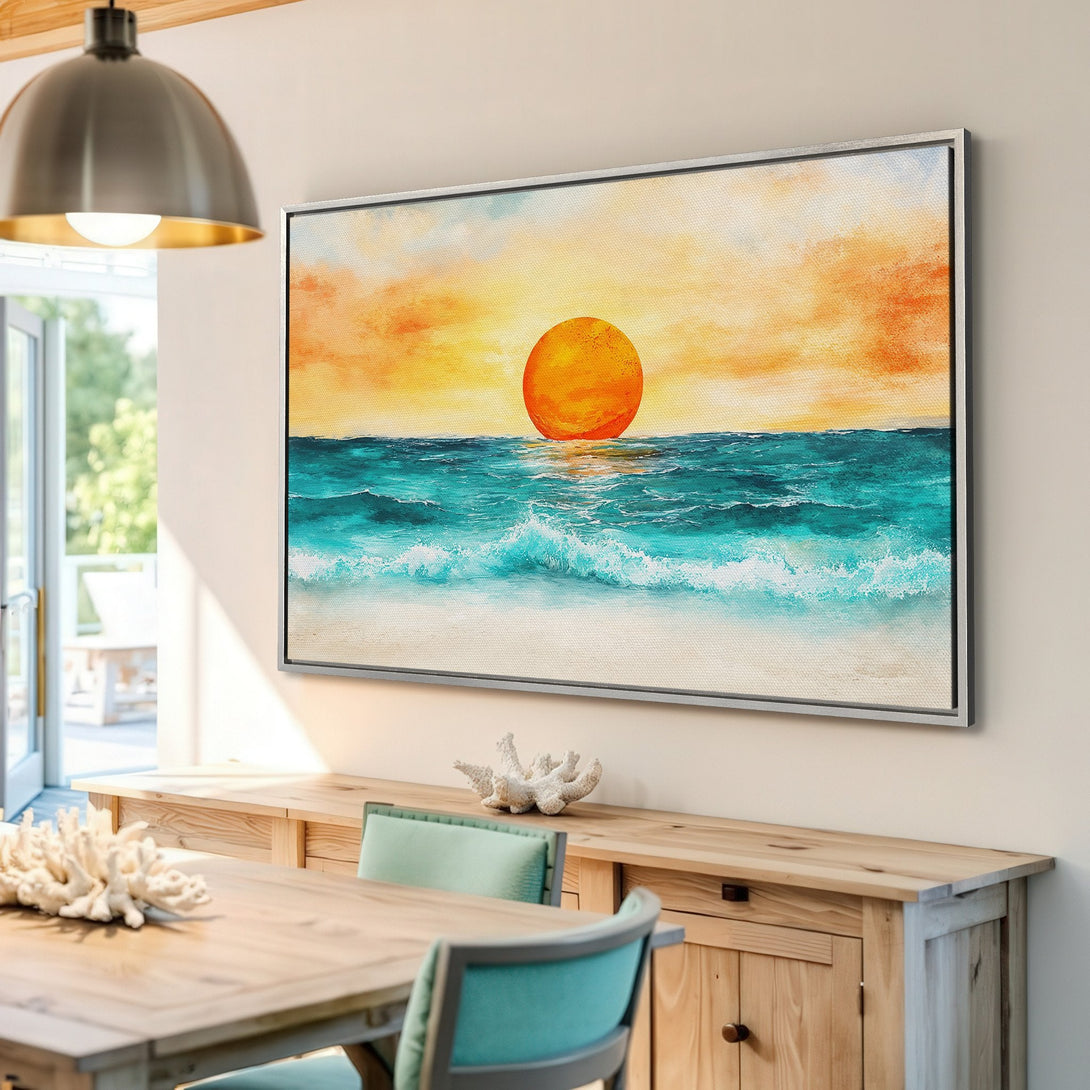 Framed Wall Art featuring a vibrant sunset over the ocean. Coastal style with warm orange, yellow, and turquoise hues. Perfect for beach house decor!