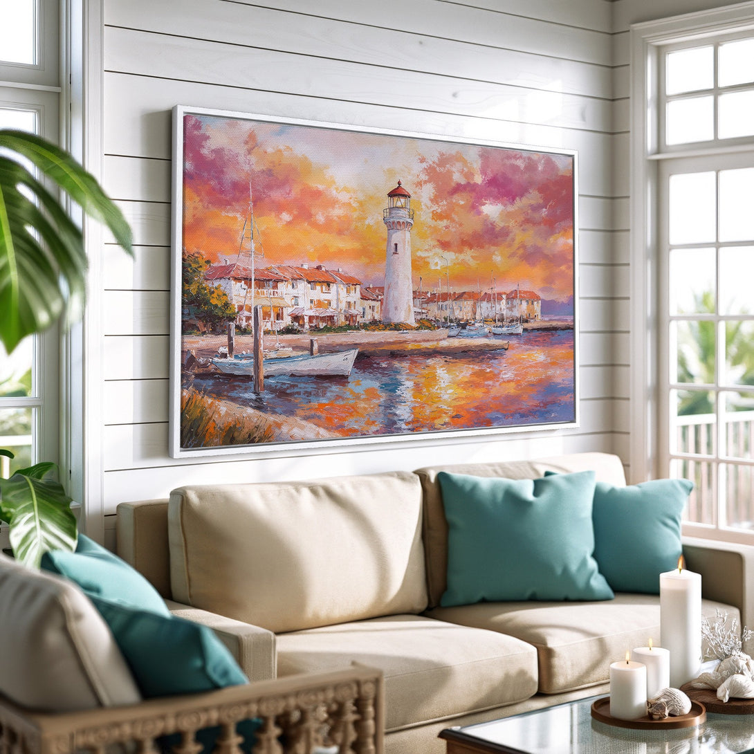 Framed Wall Art: Coastal lighthouse painting with warm sunset hues. Perfect for adding a touch of art to your living room.