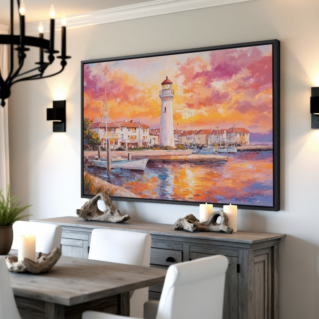 Framed Wall Art Canvas Print of a coastal lighthouse scene. Warm sunset hues of orange, pink, and yellow create a vibrant, impressionistic style. Perfect for home decor.