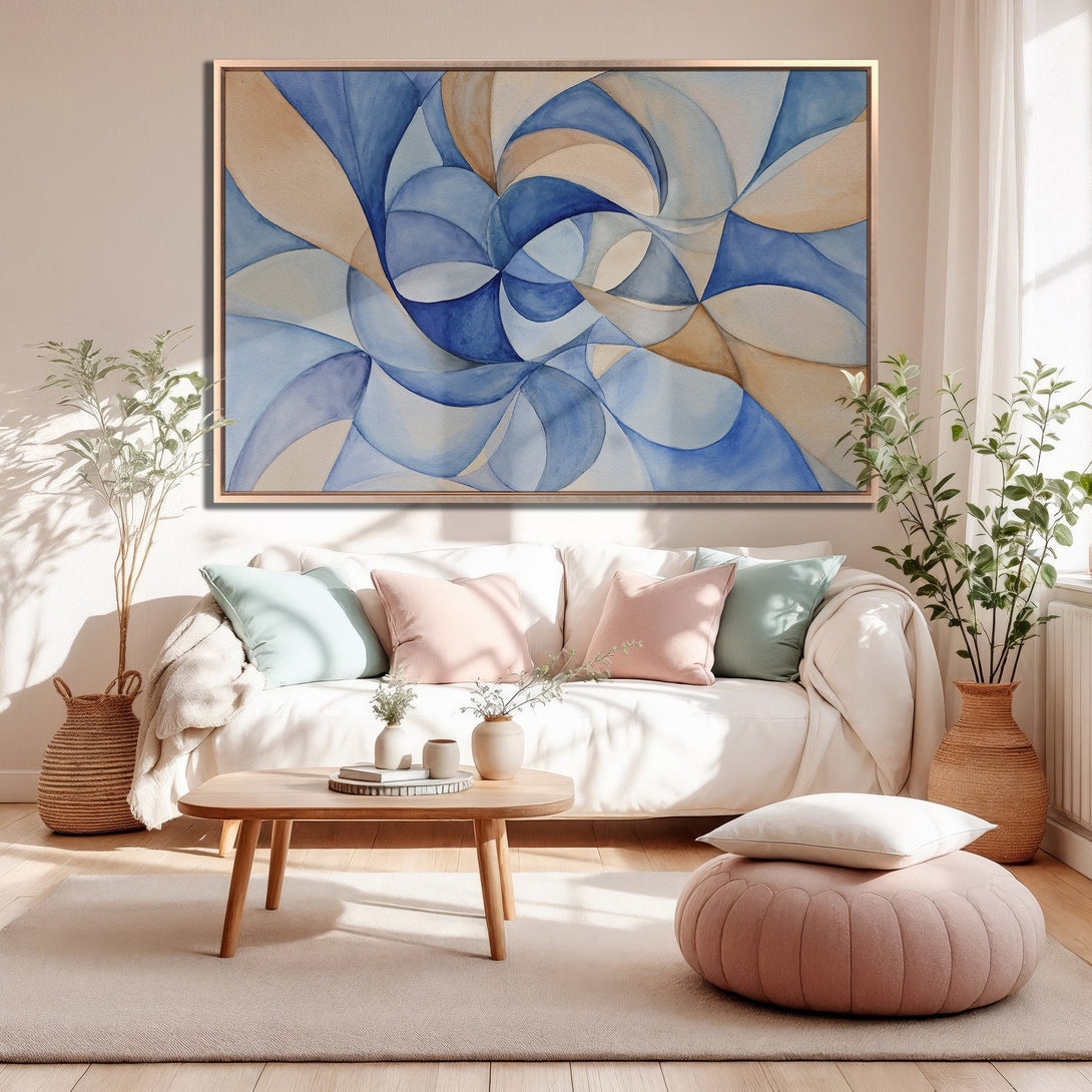 Framed Wall Art featuring a modern abstract watercolor painting in blue and beige tones, displayed in a cozy living room setting.