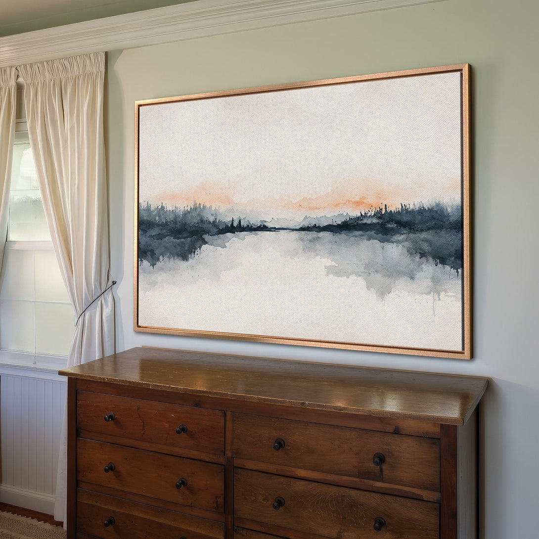 Framed Wall Art featuring a serene watercolor landscape in blue and peach tones. Perfect for adding a touch of tranquility to any room. Shop now!