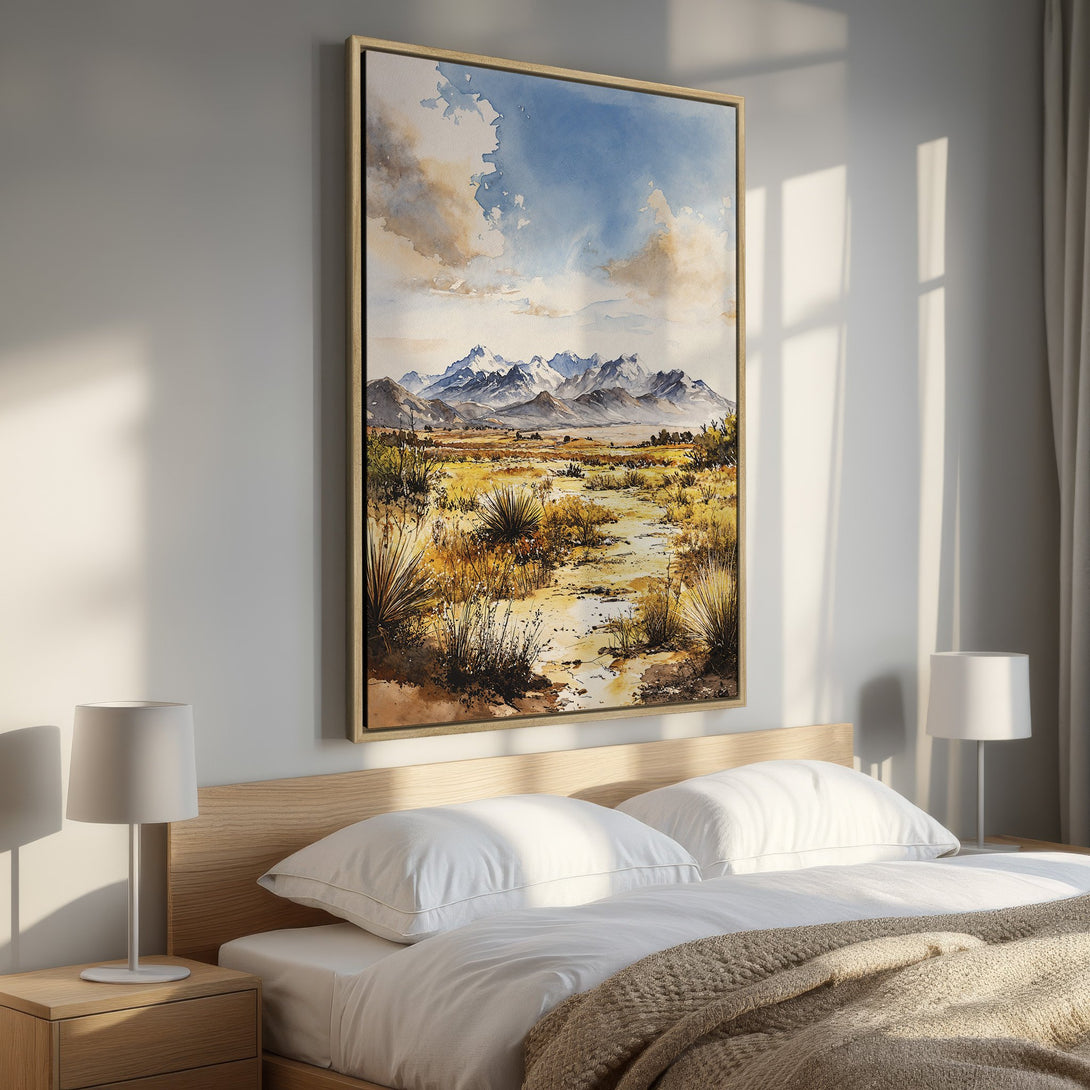 Framed Wall Art: Watercolor landscape Canvas Print featuring mountains, sky, and desert in warm earth tones. Perfect for adding a touch of nature to your bedroom decor.