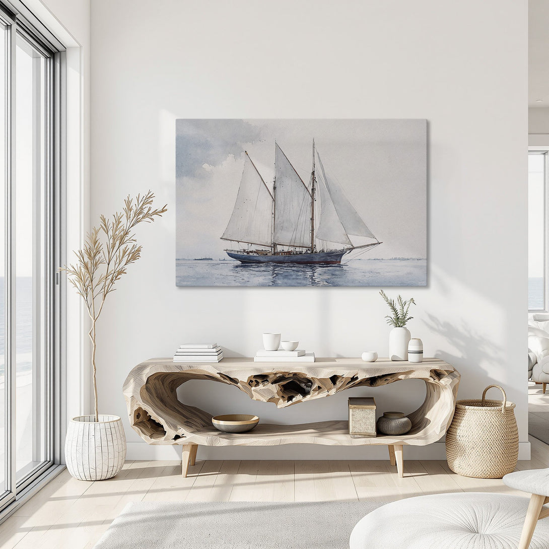 Framed Wall Art: Watercolor sailboat print with blue, white, and neutral tones. Coastal art for a serene living room.