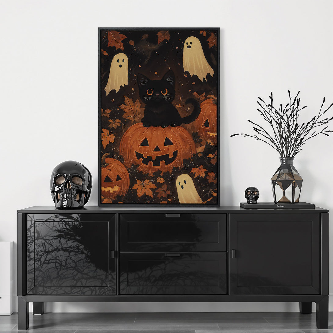 Framed Wall Art featuring a black cat on a pumpkin with ghosts, fall leaves, and a warm, autumnal color palette. Perfect Halloween home decor!
