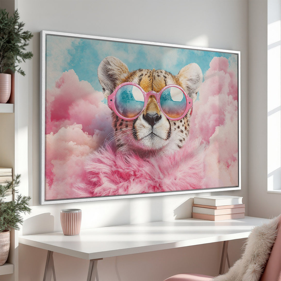 Framed Wall Art: Playful cheetah wearing sunglasses in a pink and blue cloudscape. Whimsical art with a pastel color palette, perfect for adding personality.