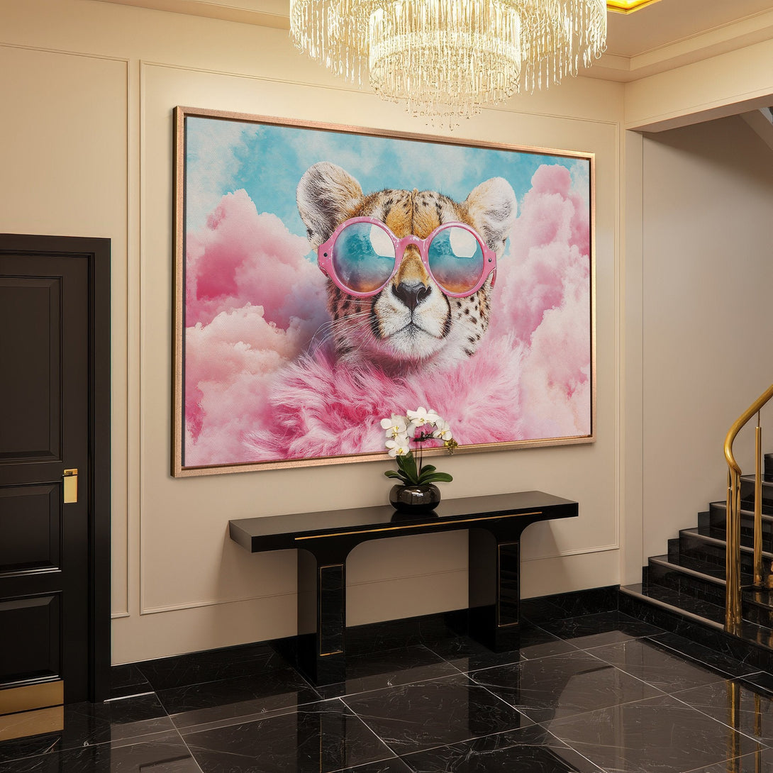 Framed Wall Art: Cheetah in pink sunglasses & clouds. Whimsical, modern decor with a pink, blue, and gold palette. Perfect for a stylish entryway.