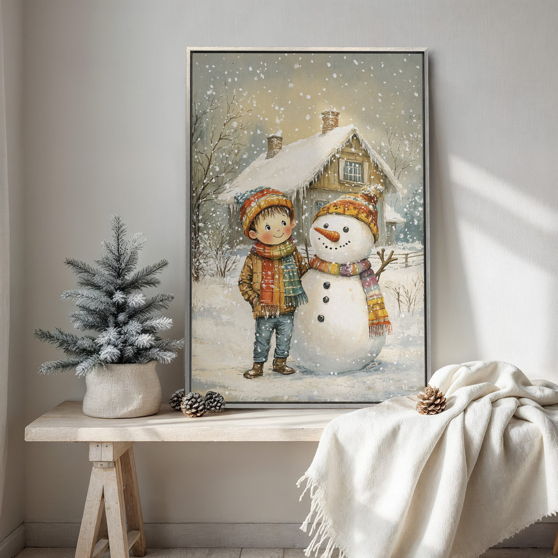 Framed Wall Art featuring a charming winter scene with a boy and snowman. Watercolor style with warm, inviting colors. Perfect for cozy home decor.