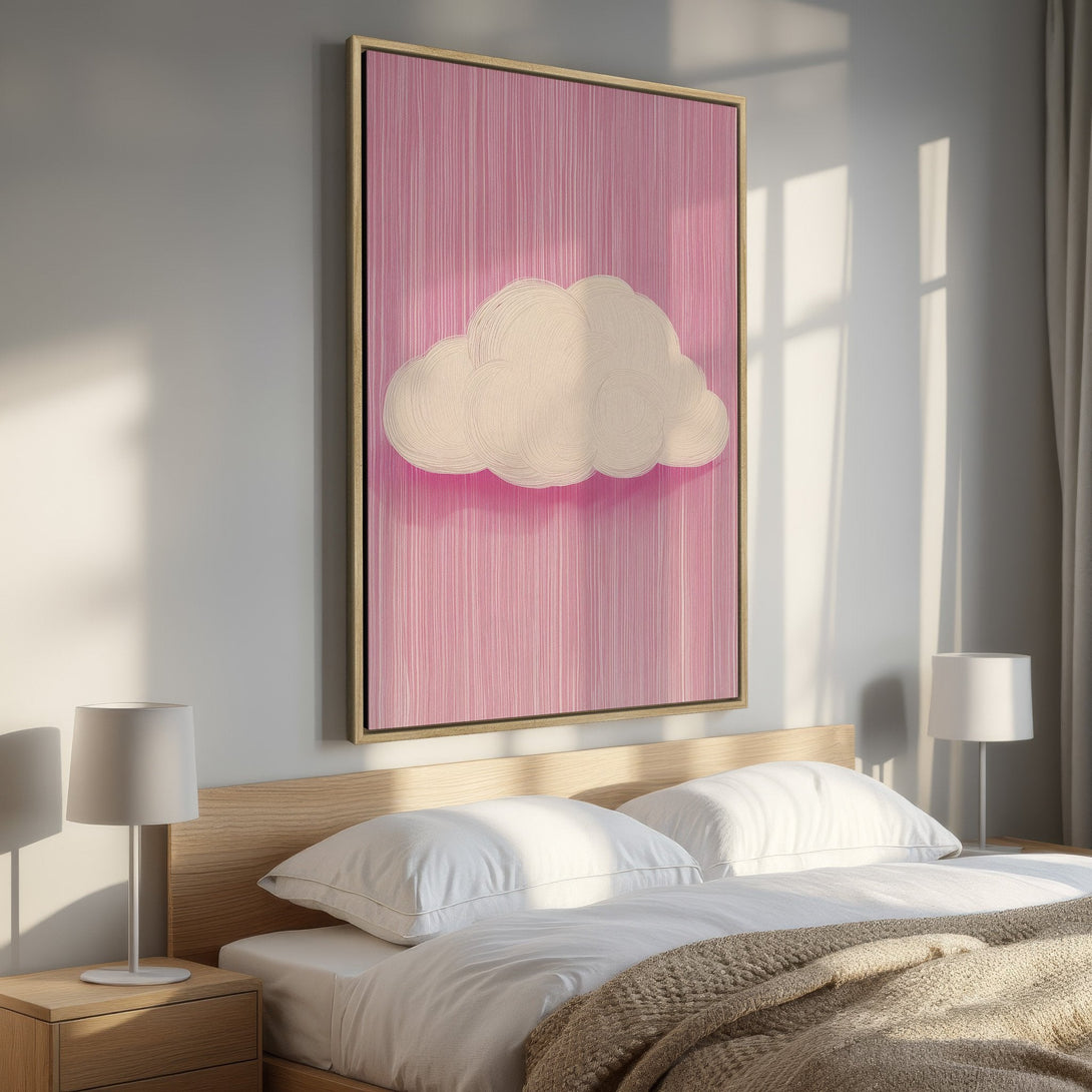 Framed Wall Art featuring a whimsical cloud on a pink background. Modern art canvas print with a soft, pastel color palette, perfect for bedroom decor.