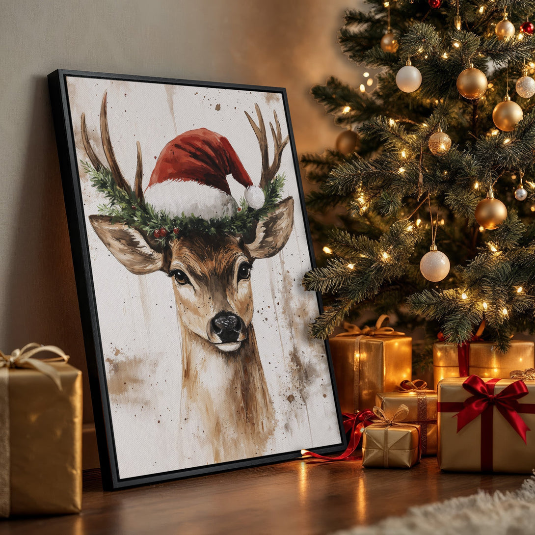 Framed Wall Art: Watercolor deer in Santa hat. Warm brown & red tones create cozy Christmas vibes. Perfect holiday decor!