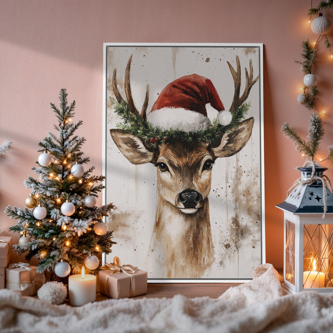 Framed Wall Art: Watercolor deer in Santa hat. Warm, neutral color palette. Perfect for holiday decor. Shop our Canvas Print collection today!