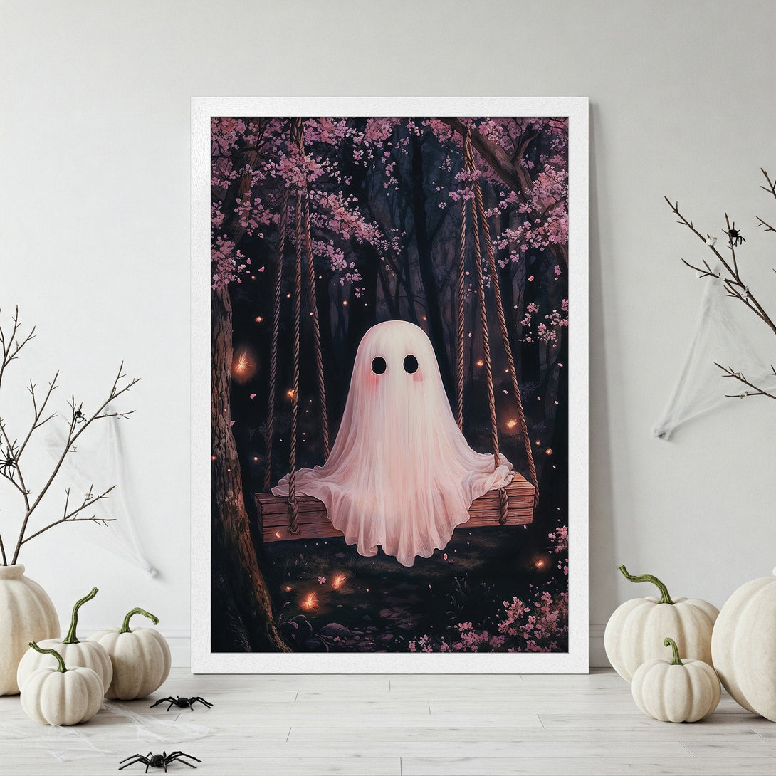 Framed Poster of a cute ghost on a swing in a whimsical forest. Soft pink and dark tones create a magical Halloween vibe.